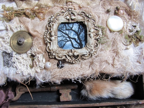 alice in wonderland, through the looking glass, taxidermy rabbit paw, rusty key, tree, assemblage
